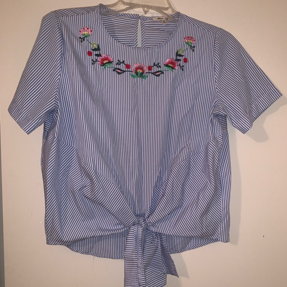 Cute women’s blouse with embroidered flowers